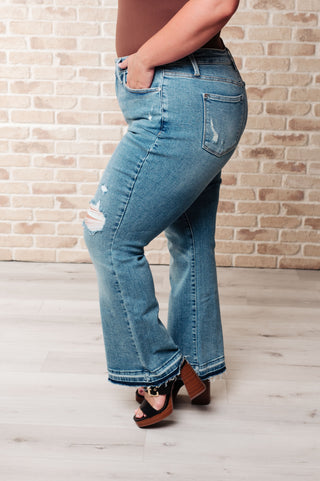 Isla Mid Rise Distressed Released Hem Bootcut Jeans-Jeans-Ave-Motis & Co Boutique, Women's Fashion Boutique in Carthage, Missouri