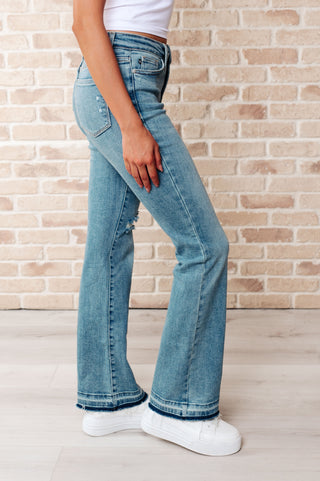 Isla Mid Rise Distressed Released Hem Bootcut Jeans-Jeans-Ave-Motis & Co Boutique, Women's Fashion Boutique in Carthage, Missouri