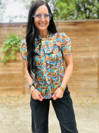 June Cowboy Art Tie Neck Blouse-Short Sleeves-Howdy Hanny-Motis & Co Boutique, Women's Fashion Boutique in Carthage, Missouri