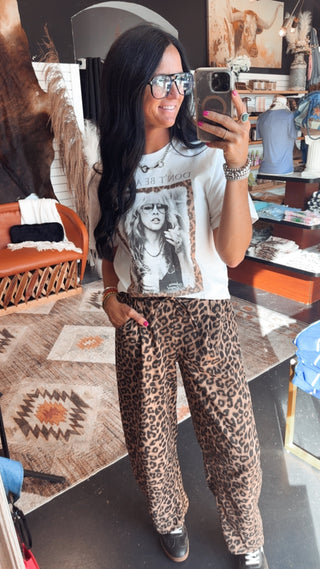 Legend Raw Hem Graphic Band Tee-Graphic Tees-Bohemian Cowgirl-Motis & Co Boutique, Women's Fashion Boutique in Carthage, Missouri