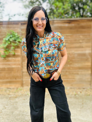 June Cowboy Art Tie Neck Blouse-Short Sleeves-Howdy Hanny-Motis & Co Boutique, Women's Fashion Boutique in Carthage, Missouri