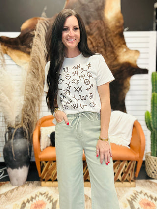 XOXO Brown Brands Boxy Graphic Tee-Graphic Tees-XOXO ART & Co-Motis & Co Boutique, Women's Fashion Boutique in Carthage, Missouri