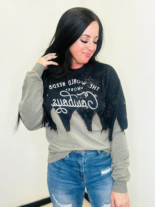 World Needs More Cowboys Bleached Sweatshirt-Pullovers-MOTIS-Motis & Co Boutique, Women's Fashion Boutique in Carthage, Missouri