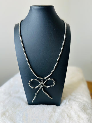 Cowboy Pearl Silver Bow Necklace-Necklaces-Western Elite-Motis & Co Boutique, Women's Fashion Boutique in Carthage, Missouri