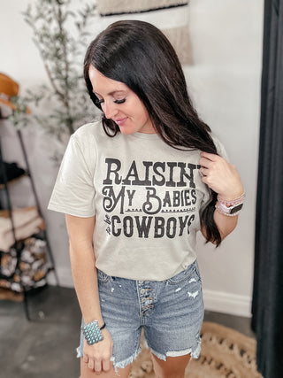 Raisin' My Babies To Be Cowboys-Graphic Tees-The Lattimore Claim-Motis & Co Boutique, Women's Fashion Boutique in Carthage, Missouri